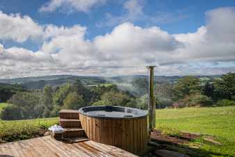 Luxevilla voor 12 in de Ardennen met 5 slaapkamers. Sauna en knap uitzicht.